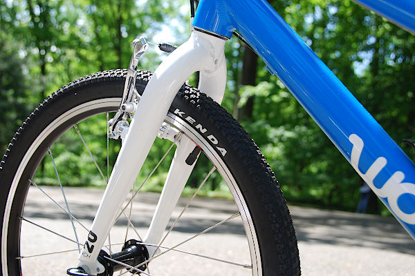 Front wheel and fork of 16 inch Woom bicycle